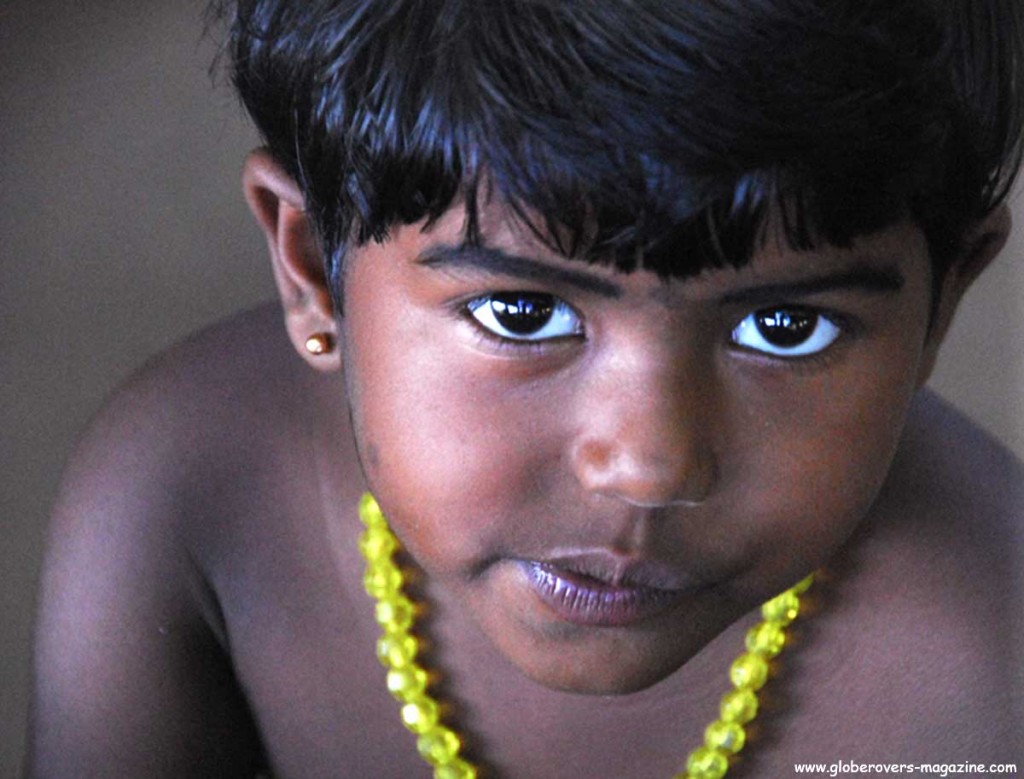 Portraits - Girl along the backwaters visited by the houseboat on the backwaters of Alleppey, Kerala, INDIA